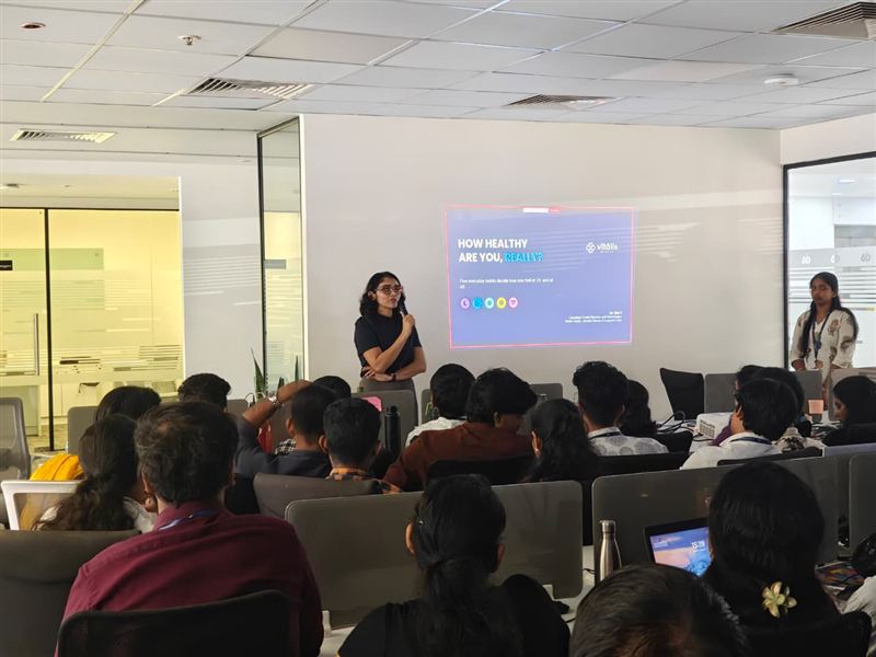 A physician answering questions after a workplace health talk